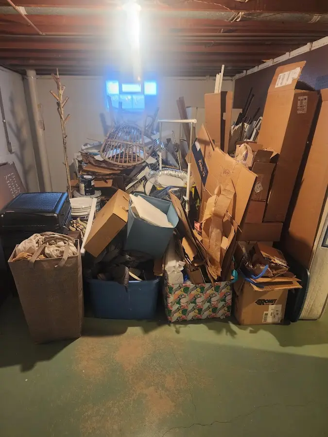 Roll-off dumpster container at job site for Concrete Dumpster Rental in Ashville